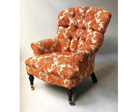 ARMCHAIR, Victorian style with upholstered deep button back in terracotta foliate fabric and turned front supports.