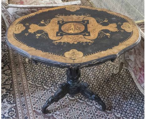 LAMP TABLE, mid 19th century Swiss ebonised and walnut, the shaped top inlaid with marquetry alpine scenes on column and carv