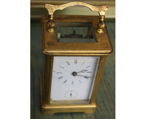 A French 19th/20th Century alarm carriage clock, 11.5cm high (not including handle)