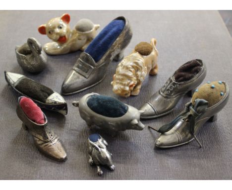 Assorted pin cushions, animals, shoes etc. ceramic and silver coloured metal 