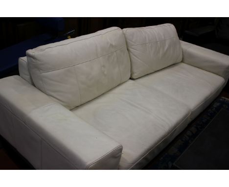 A cream leather sofa 212cm wide 