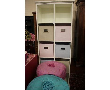 Three leather pouffe and a shelving unit