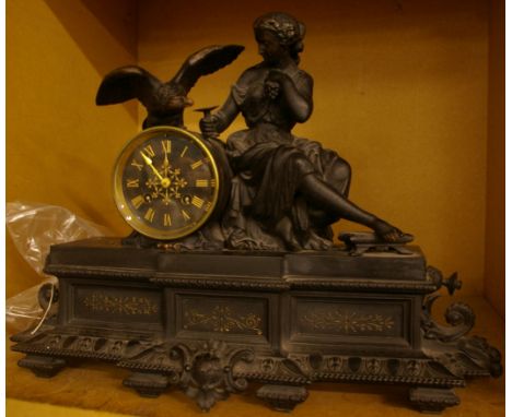 A black marble figural mantel clock, 34cm high approx. 