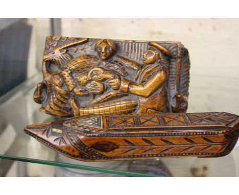 A carved treen table top snuff box, late 18th / early 19th century, of basically rectangular form, the hinged cover carved in