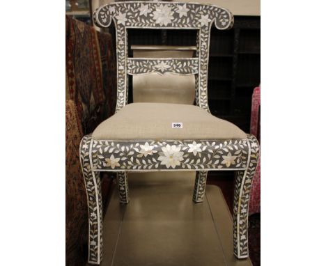 An Indian mother of pearl inlaid chair