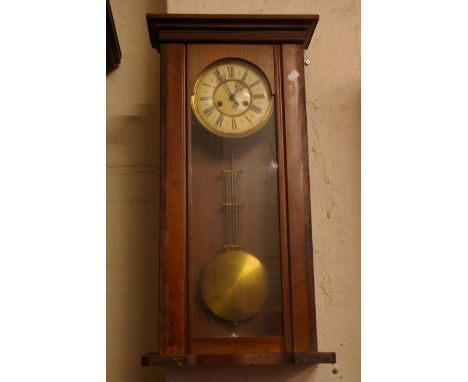 A 1930's mahogany wall clock and another 