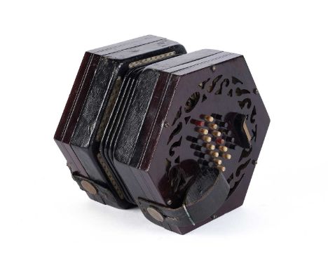A 48-button English system concertina with fret-cut rosewood ends, five division bellows, in a velvet-lined mahogany case.
