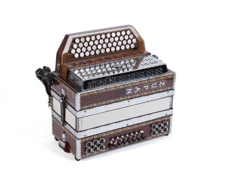 A Zupan Alpe IV D Harmonika four-row diatonic button accordion, with burr wood, marquetry, and polished chrome finish, in a f