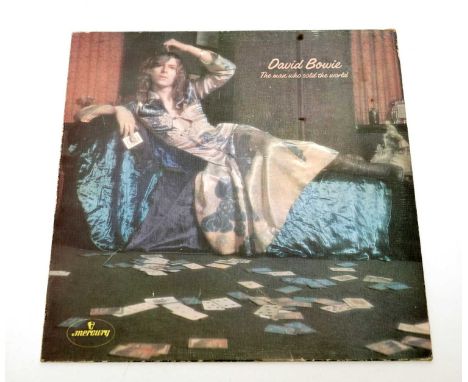 A 1971 original UK pressing of David Bowie - The Man Who Sold The World, with the very early 'Dress Sleeve' cover art and mis