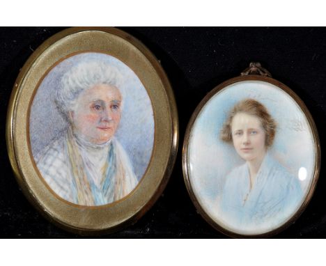 K*** Collins - a miniature bust portrait of a young woman wearing a blue blouse and a crucifix, signed, 7 x 5.8cms; 2 3/4 x 2