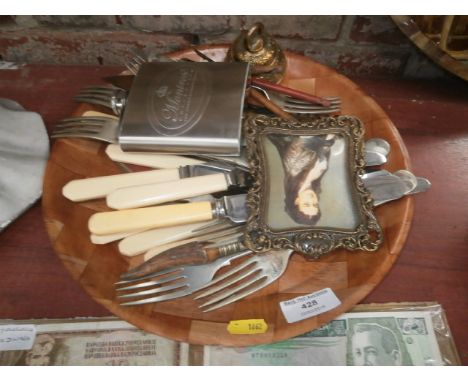 tray of flatware, photo frame and hip flask