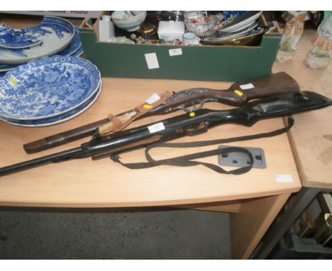hoof knife, decorative rifle and a 22. air rifle