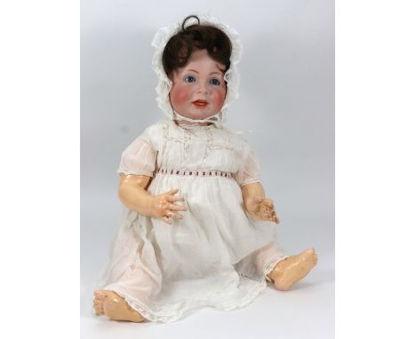 A large Kammer & Reinhardt 116A bisque head character doll, German circa 1910, with weighted blue glass eyes, open/closed mou