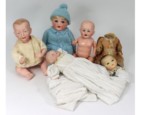 A small Kammer & Reinhardt 100 ‘Kaiser’ bisque head baby doll, German circa 1910, with blue intaglio eyes, single stroke brow