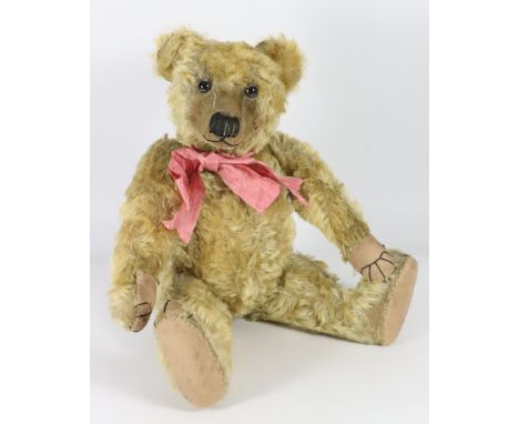 A Farnell mohair Teddy bear, English 1920s, golden mohair bear with glass eyes with remains of paint, vertically stitched nos