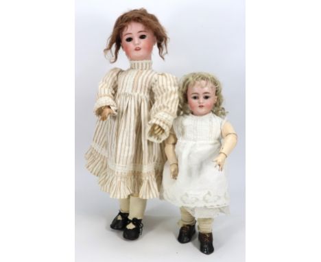 Simon & Halbig bisque head mechanical walking doll, German circa 1910, with weighted brown glass eyes, open mouth, upper teet
