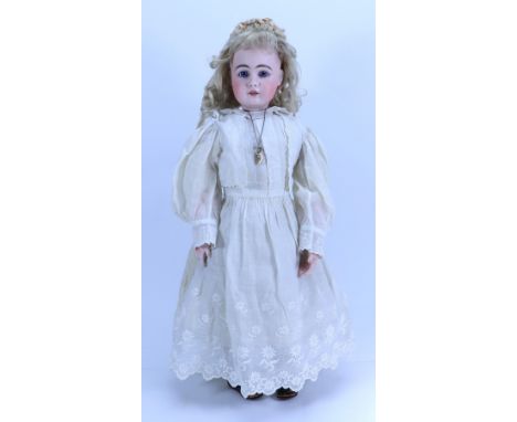 A Simon & Halbig 949 bisque shoulder head doll, German circa 1900, the pale bisque swivel head with fixed blue glass eyes, pa
