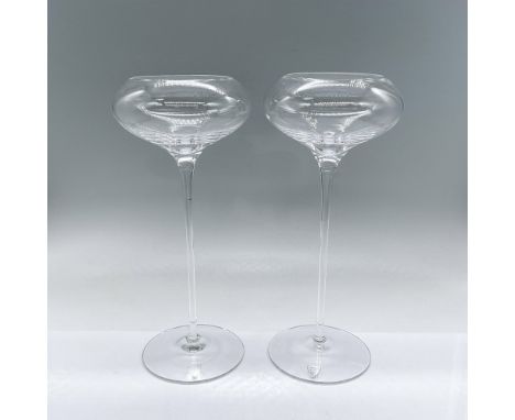 Two tall clear crystal votive holders. Orrefors mark. Dimensions: 10.5"H x 4.25" diaManufacturer: OrreforsCountry of Origin: 