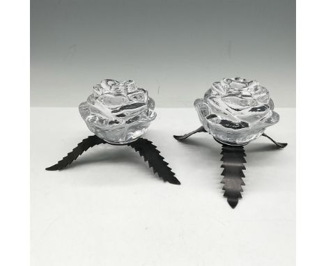 Sculpted rose glass design set on 3 leaf metal legs. Kosta Boda mark. This item has its original box: 6"L x 6"W x 4.5"H. Arti