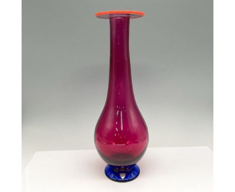 Modern ideas blend function with style with this long neck wine colored vase with orange rim and blue base. Colorful addition