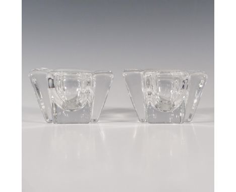 Thick clear crystal duo in a cubic cross shape. Orrefors etched backstamp. Artist: Anna EhrnerDimensions: 4''L x 4''W x 2.5''