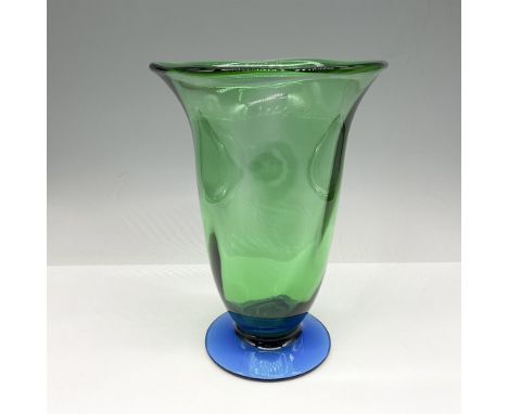 Modern crystal with wave rim and wide green glass tapering into cobalt base. Orrefors mark. Issued: 21st centuryDimensions: 8