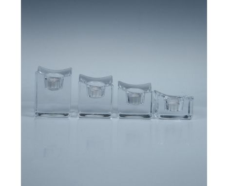 Sophisticated set of graduated votive candle holders featuring a sleek slanted top on each cube for a modern touch. Shortest 