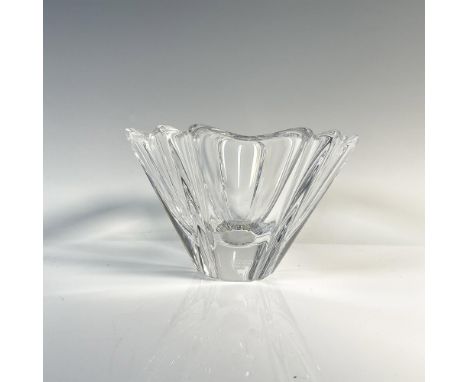 Clear and resembling a flower in bloom with a narrow base. Orrefors manufacturing sticker Orrefors backstamp. This item has i