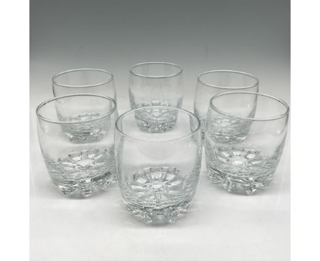 Clear round 9oz. glasses with dimpled base. This item has its original box: 10"L x 7"W x 4"H. Issued: 21st centuryDimensions: