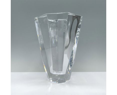 Clear and boasts a hexagonal shape with sleek, polished edges. Orrefors manufacturing sticker. Orrefors backstamp. Dimensions