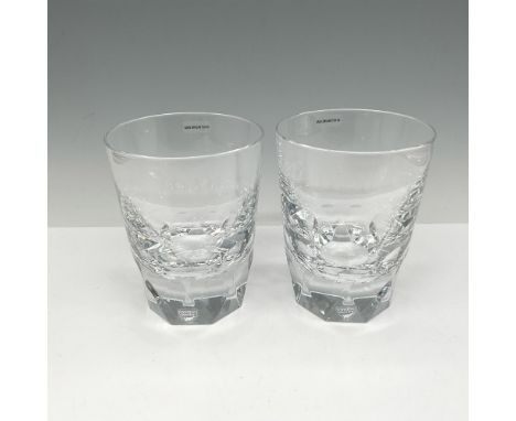 Clear crystal tumbler with cut base. Orrefors mark. This item has its original box: 3.75"L x 3.75"W x 5"H. Artist: Lena Bergs