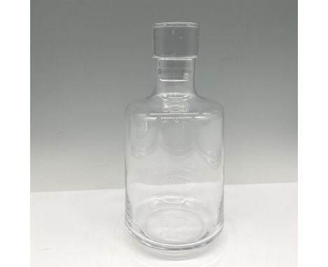 New in Box - Sleek clear glass decanter with stopper holds 1.46 qt. Krosno acid mark, Hotel Collection mark. This item has it
