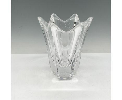 Clear crystal with scalloped top and tapered to weighted base. Orrefors mark. This item has its original box: 7"L x 5"W x 4.5