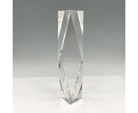 A modernist, faceted tower with angles that catch light. This item has its original box: 4.5"L x 12"W x 3"H. Issued: 21st cen