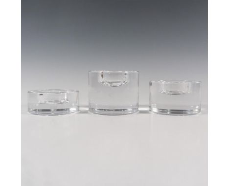 Set of tree cylindrical clear crystal in small, medium and large sizes. Orrefors etched backstamp. Largest piece dimensions: 