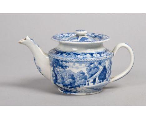 An early 19c pearlware blue and white miniature teapot and cover decorated with rural scenes of horse and carts outside a cot