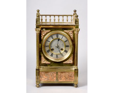A late 19c French mantel clock in brass rectangular case. The 5in diam two piece silvered dial has Roman numerals and a brass