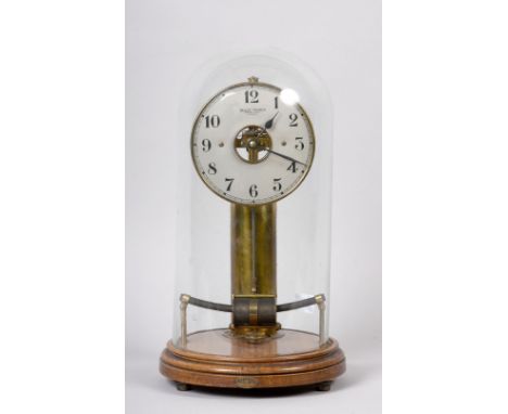 A late 19c/early 20c French Bulle electric clock, the movement supported on a brass column mounted on a 8in diam. circular ti