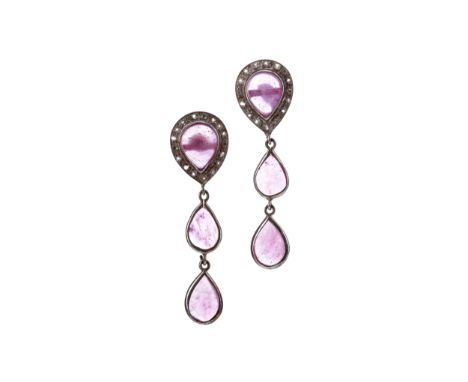 PAIR OF RUBY EARRINGS, the posts set with a teardrop shaped ruby surrounded by white gems, some testing as diamonds, with two