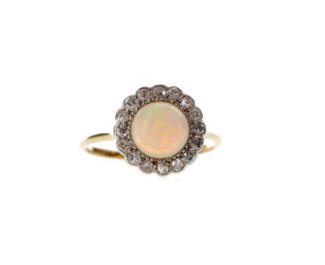 OPAL RING, set with a cabochon opal 7.2mm in diameter, within a halo of round brilliant cut diamonds marked 'PLAT' and '18CT'