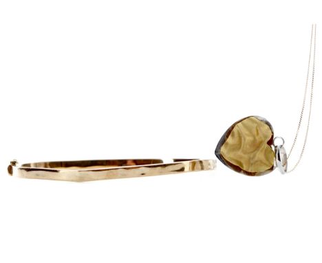 HEART PENDANT, with overlaid gold section, 20mm high, marked 375, along with a bangle marked 9KT, 8.9g gross (2)