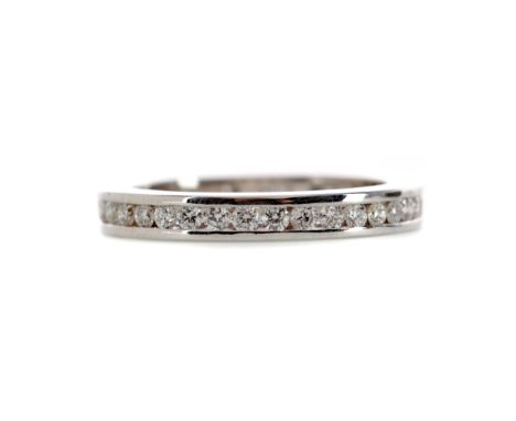 DIAMOND ETERNITY RING, set with round brilliant cut diamonds totalling approximately 0.85 carats, unmarked, size M 1/2, 3.8g