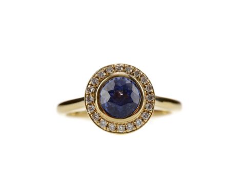 SAPPHIRE AND DIAMOND RING, set with a round sapphire within a halo of round brilliant cut diamonds, totalling approximately 0