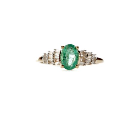 EMERALD AND DIAMOND RING, set with an oval emerald flanked by tiered baguette cut diamonds, unmarked, size L 1/2, 1.5g