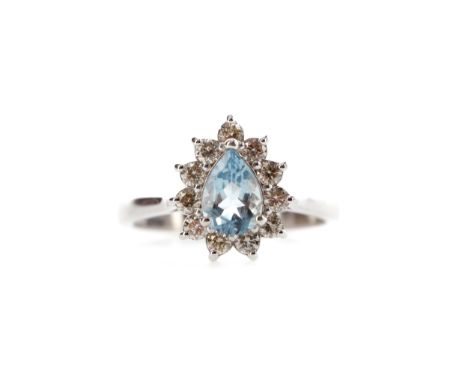 AQUAMARINE AND DIAMOND RING, set with a pear shaped aquamarine of approximately 0.60 carats within a halo of round brilliant 