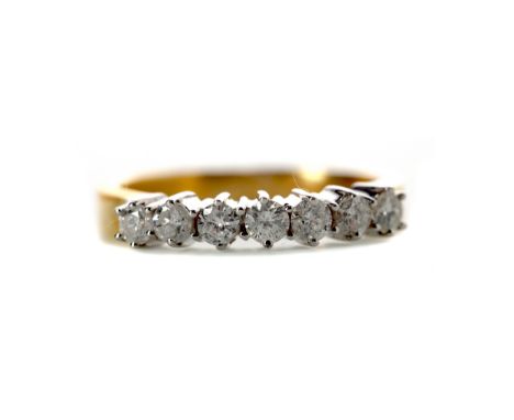 DIAMOND SEVEN STONE RING, set with round brilliant cut diamonds totalling approximately 0.50 carats, in eighteen carat gold, 