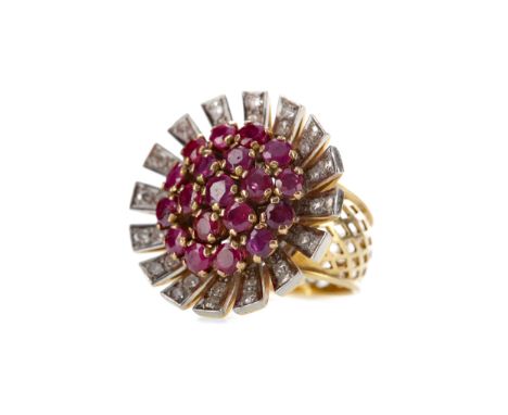 RUBY AND DIAMOND RING, the central section set with round rubies totalling approximately 3.00 carats with radiating diamond s