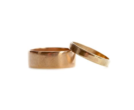 BROAD NINE CARAT ROSE GOLD WEDDING RING, size Z+, and another gold wedding ring, size U 1/2, 9.3g gross (2)