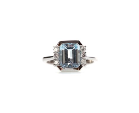 AQUAMARINE AND DIAMOND RING, set with a step cut aquamarine of approximately 2.75 carats flanked by three diamonds on either 