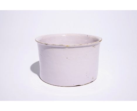 A large white Dutch Delft albarello, 18th C. Dia.: 20 cm - H.: 12 cm  The unusual pink tone probably due to a contamination o